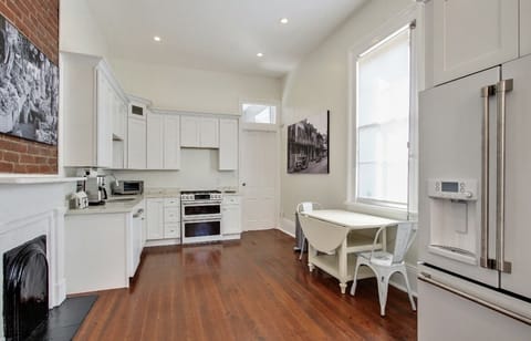 Spacious kitchen with stainless steel appliances. For cooking and entertainment.