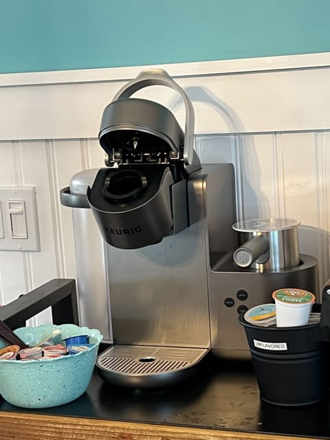 Keurig Cafe (has a frother) makes coffee, latte, and cappuccino with K-cups 