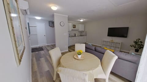 Open Concept Dining Area. Enjoy your meals on the 4 seating dining table.