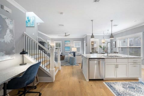 The kitchen island keeps you invited to the living space.