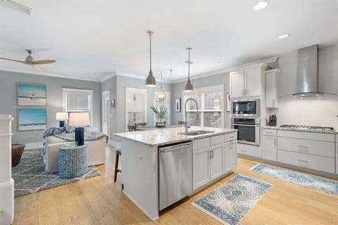 Gas grill and modern appliances for cooking needs.