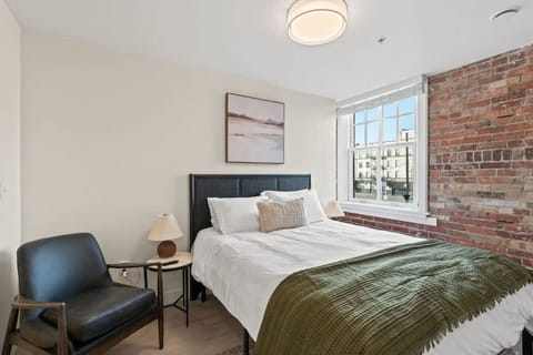 Luxury queen bed for a restful night’s sleep.