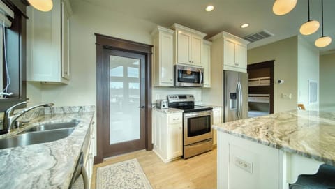 Modern Kitchen with all Stainless Steel Appliances