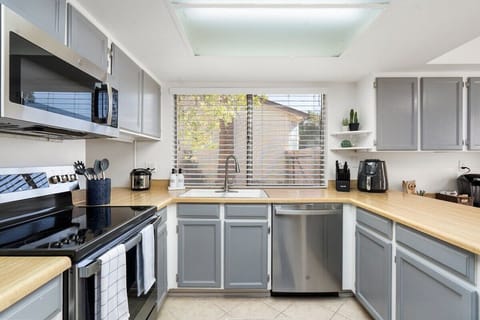 Well-lit kitchen with appliances
