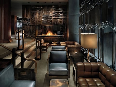 Gather by the glowing fireplace for a cozy, upscale nightcap.