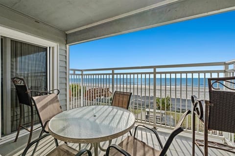 Step onto your private beachfront balcony and savor morning coffee while watching waves roll onto pristine sand below.
