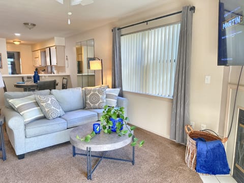 Our living room is comfortable, and features lots of seating.