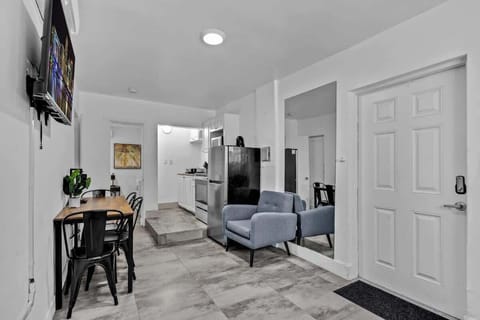 Chill out in this modern nook with leather seating, smart TV, and clean design—perfect for short stays.

