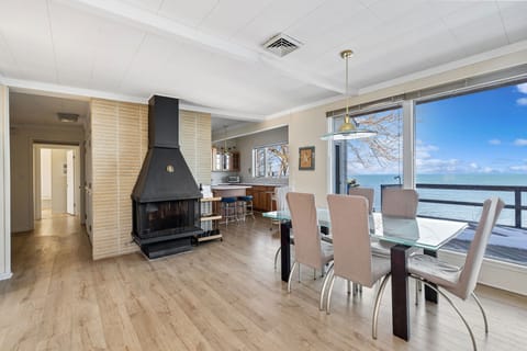 The spacious dining area offers plenty of room for everyone to gather around at mealtime.