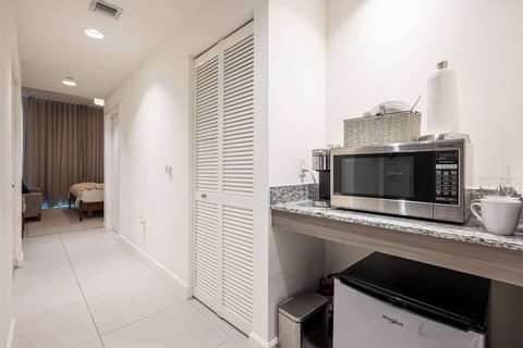 2nd Master has a King Size Bed, private bathroom and kitchen appliances.  Unit has a private entry door or connects with the rest of the apartment.  Available as single unit studio or as a part of the 3 bedroom unit.