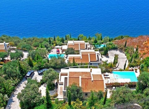 3 independent identical villas, built on levels, each with a pool and sea views