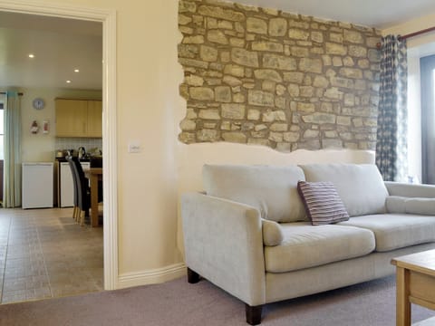 Living room is conveniently situated next to kitchen/diner | The Creamery, North Wootton, near Wells