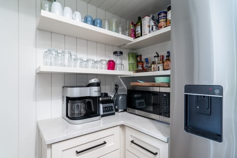 Modern wall shelves and coffee station