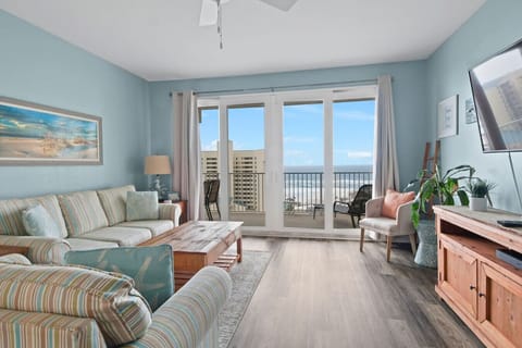 Living Area with Ocean Views, Flat Screen TV, Sleeper Sofa and Private Balcony Access