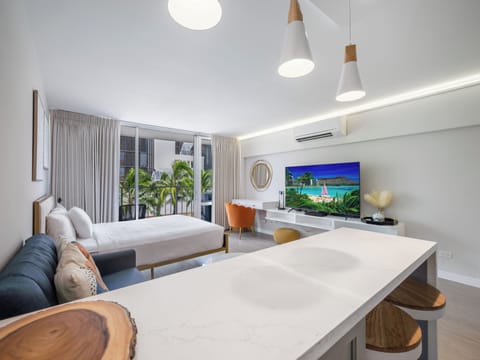 Room with TV, queen bed, sofa bed, desk, AC, and balcony - Room with queen bed, sofa bed, work station, desk chair, smart TV, AC and balcony