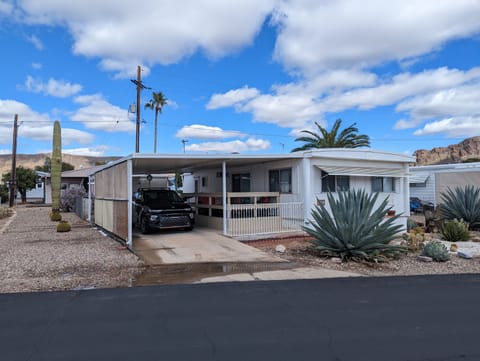car port and and side yard will park up to 2 vehicles, bikes, golf cart.