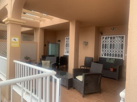 Balcony with dining table for 6 .. small sofa and 2chairs 