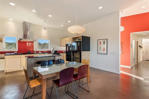 Dining area and kitchen to entry and hall