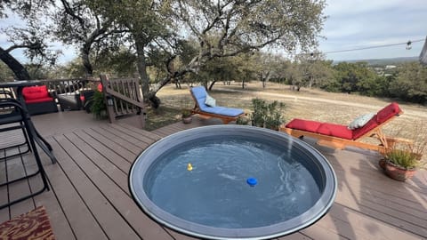 Enjoy our heated Cowboy pool, spacious deck and wide open property.