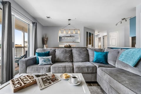 Movie nights and chill - Our cozy beach living room has got you covered