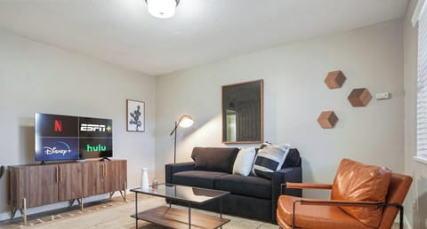 Living room with sleeper sofa and smart tv