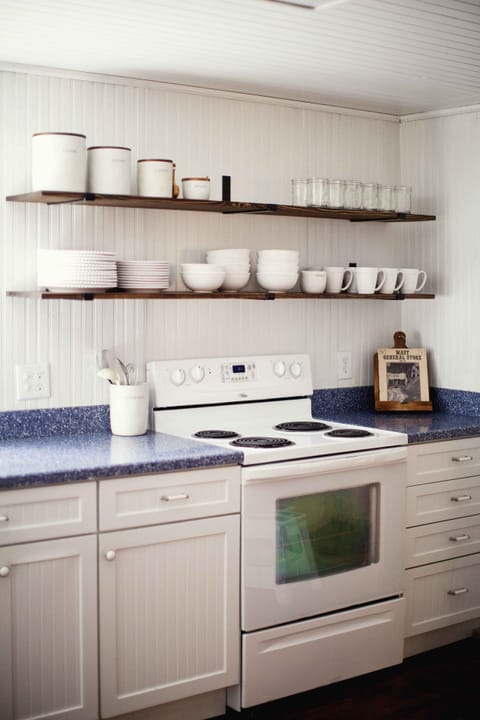 Cozy kitchen fully stocked with kitchen essentials.