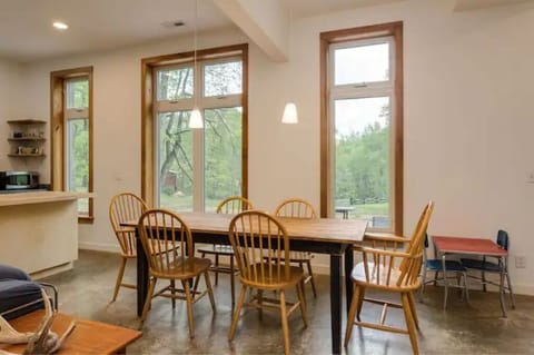 Tall, operable windows bring the outdoors in