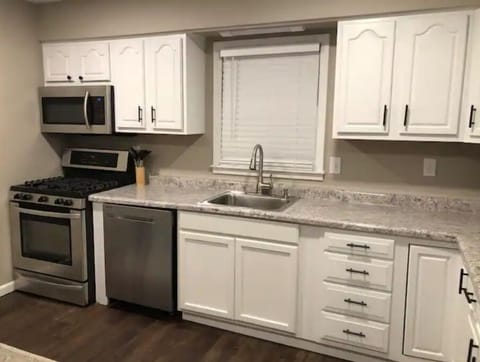 Fully equipped kitchen for cooking and baking.