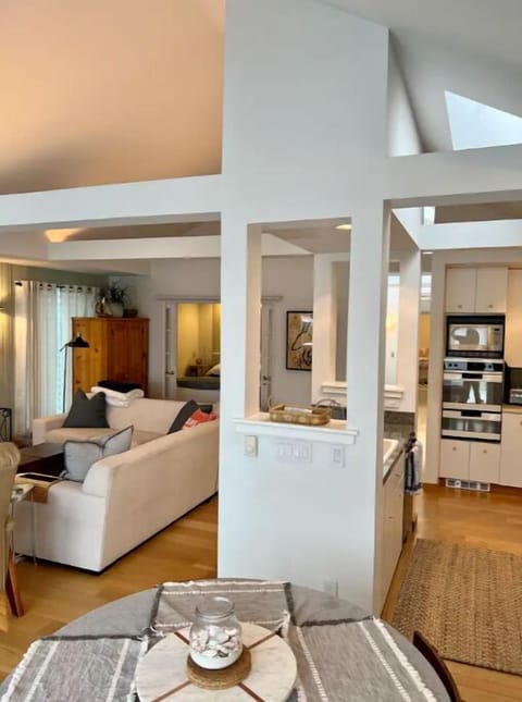 View to kitchen and family area from dining table.