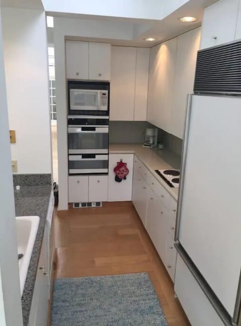 Fully-stocked kitchen w/ Sub-Zero, ovens, new d/w & micro. Impeccably clean.