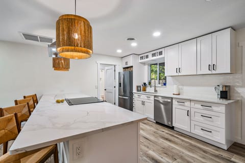 Large island and easy access for indoor/outdoor entertaining.