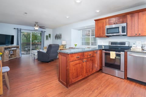 Spacious kitchen island for meal prep and casual seating.