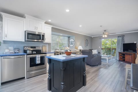 Multitasking made easy with our open concept layout - kitchen next to the living room.
