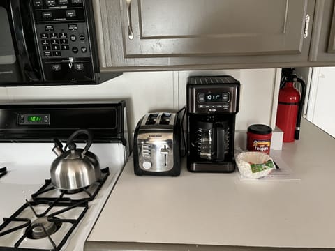 Coffee maker, tea kettle, and toaster to start your day.
