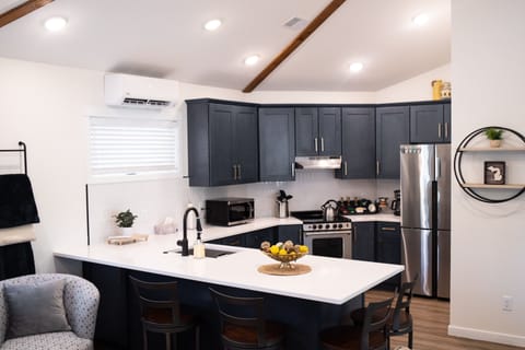 Entire kitchen view from the front entry way.