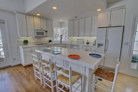 The Large Island is in the kitchen to enjoy and have a meal.