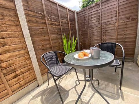 Enjoy the sun on the patio with a snack.