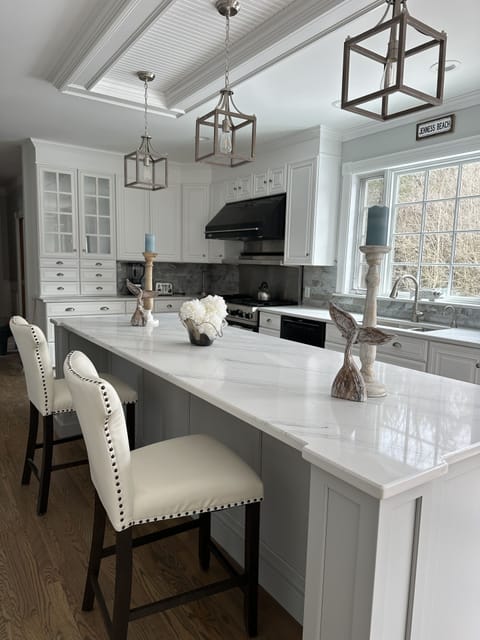 Have your morning coffee in this spacious renovated kitchen