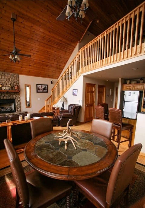 Dining room- seats 6 with extra chairs. Adjacent kitchen peninsula seats 3 more