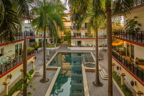 Welcome to La Mision De Mita-Surf & Sea!  Views of the pool and lounging area!