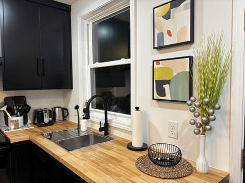 Well-lit kitchen workspace with contemporary finishes