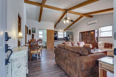 Spacious retreat featuring charming decor and striking wood beams—perfect for relaxing.