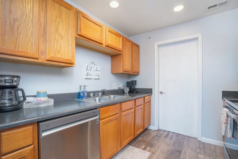 Welcome to our kitchen, where the sink isn't just for dishes—it's a multitasking marvel! Brew up some magic with the coffee maker, tackle the morning mess, and even throw in a load of laundry while you cook up your next culinary masterpiece.