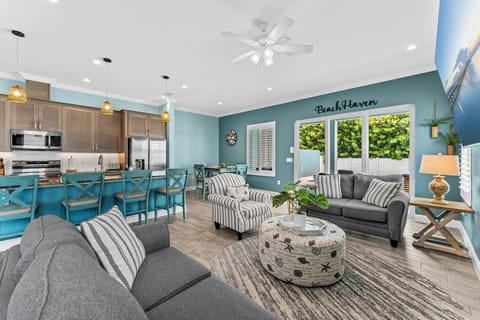 Step from the living room on the main floor directly onto the patio. 