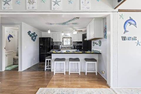 Kitchen Bar overlooking Dining Area & Living Area