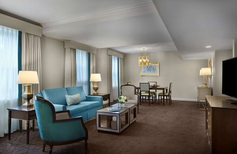 Gather together in a spacious suite with comfy seating.