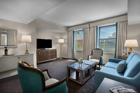 Gather for cozy conversations on plush seating and soft lighting.