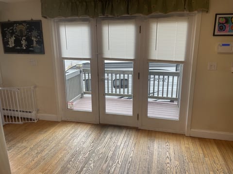 These big doors leading out to the screened-in porch let in so much light