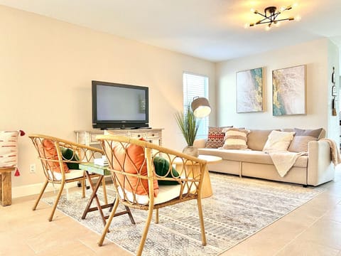 A stylish setup with plush seating, lights, and creative wall decor
