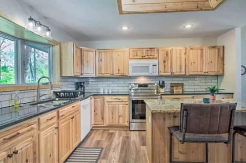 Well lit kitchen w/skylight